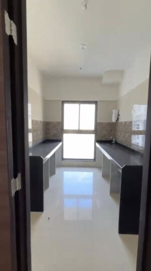 Kitchen in 2 BHK Apartment at Rajesh Raj Infinia, Malad West – for Rent