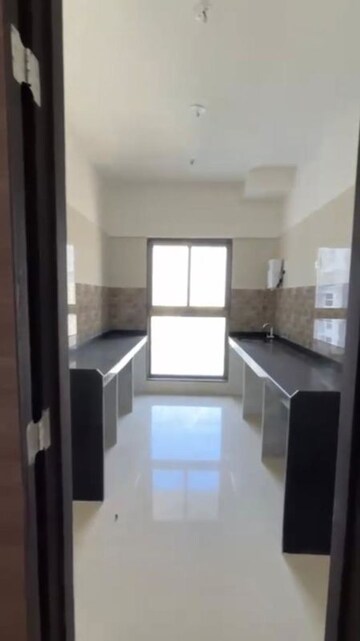 Kitchen in 2 BHK Apartment at Rajesh Raj Infinia, Malad West – for Rent