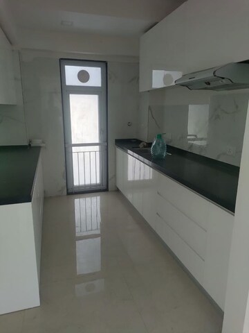 Kitchen in 3 BHK Apartment at Ruparel Ariana, Parel – for Rent