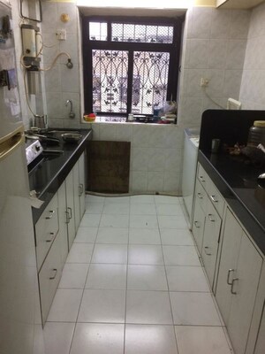 Kitchen in 3 BHK Apartment at Poonam Tower, Andheri West – for Rent