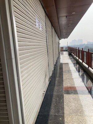 Balcony in  Shop at Saviour Lord Krishna Mart, Sector 19 Yamuna Expressway – for Sale