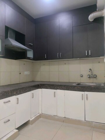 Kitchen in 2 BHK Apartment at Panchsheel Greens II, Sector 16 Greater Noida – for Sale