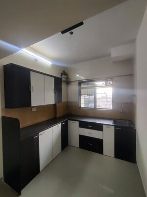 Kitchen in 1.5 BHK Apartment at Rosa Gardenia, Ghodbunder Road – for Rent