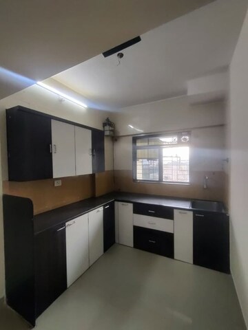 Kitchen in 1.5 BHK Apartment at Rosa Gardenia, Ghodbunder Road – for Rent