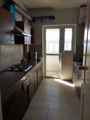 Kitchen in 4 BHK Apartment at Umang Monsoon Breeze Phase I, Sector 78 – for Sale
