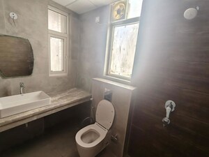 Bathroom in 2 BHK Apartment at Ace Starlit, Sector 152 – for Sale