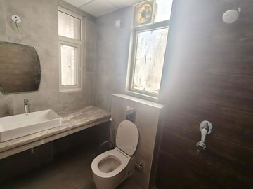 Bathroom in 2 BHK Apartment at Ace Starlit, Sector 152 – for Sale