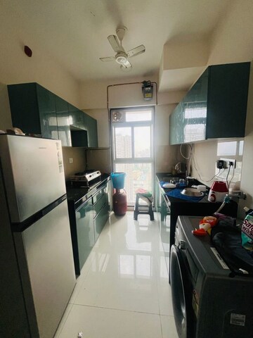 Kitchen in 2 BHK Apartment at Runwal Nirvana, Parel – for Rent
