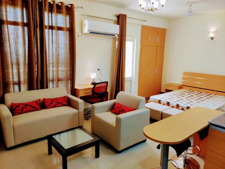 Living Room, supertech-czar-suites Studio 535 Sq.Ft. Apartment In Omicron I Greater Noida Greater Noida 9694832