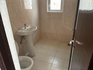 Bathroom in 3 BHK Apartment at Amrapali Princely Estate, Sector 76 – for Sale