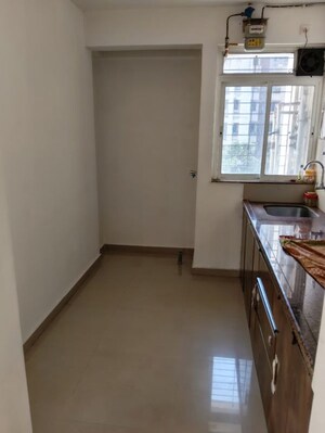 Kitchen in 2 BHK Apartment at DB Parkwoods, Kasarvadavali – for Rent