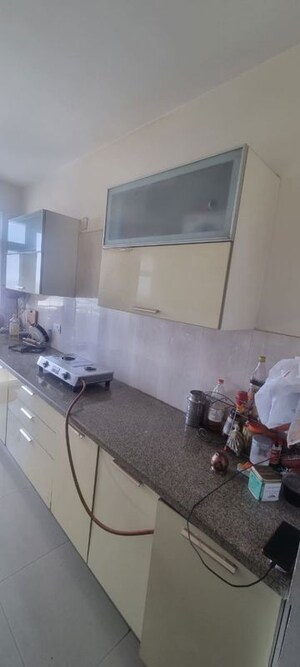 Kitchen in 2 BHK Apartment at ROF Aalayas, Sector 102 – for Sale