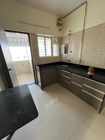 Kitchen in 2 BHK Apartment at Karve Putala, Kothrud – for Rent