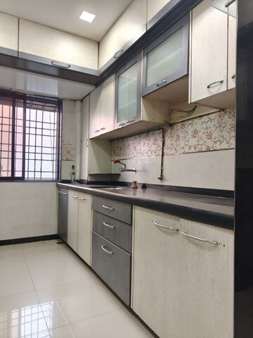 Kitchen in 2 BHK Apartment at Akshar Shreeji Heights, Seawoods – for Rent