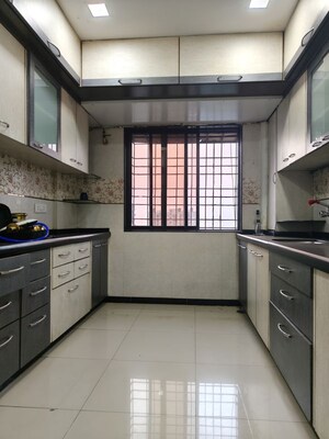 Kitchen in 2 BHK Apartment at Akshar Shreeji Heights, Seawoods – for Rent