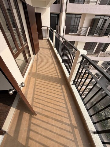 Balcony in 2 BHK Apartment at Cosmos Express 99, Sector 99 – for Rent