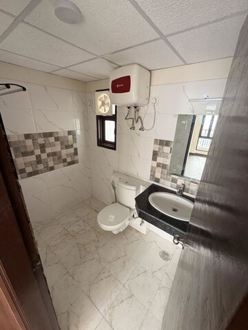 Bathroom in 2 BHK Apartment at Cosmos Express 99, Sector 99 – for Rent