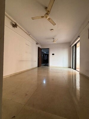 Living Room in 2 BHK Apartment at Lodha Lakeshore Greens, Dombivli East – for Sale