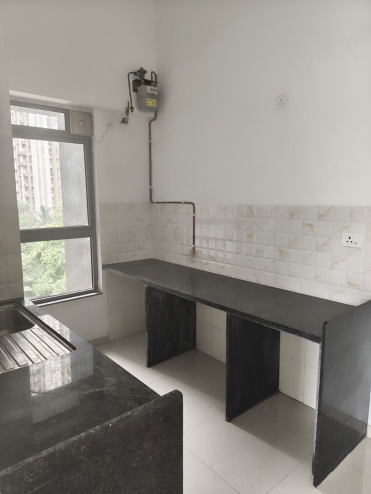 Kitchen, unnathi-woods-phase-3 2 Bedroom 750 Sq.Ft. Apartment In Ghodbunder Road Thane 9698138