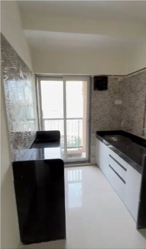 Kitchen in 1 BHK Apartment at Raunak Residency Thane, Pokhran Road No One – for Sale