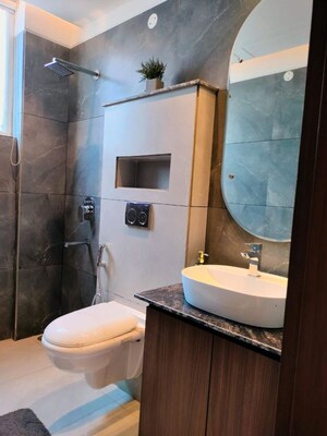 Bathroom in 4 BHK Apartment at Dhakoli – for Sale