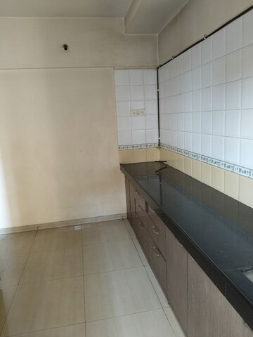 Kitchen in 3 BHK Apartment at Kesar Gardens, Kharghar – for Sale