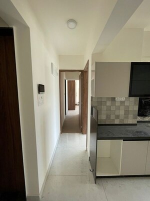 Kitchen in 2 BHK Apartment at D And T Mountain View CHS, Senapati Bapat Road – for Rent