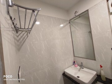 Bathroom in 2 BHK Apartment at Omkar Ananta, Goregaon East – for Rent