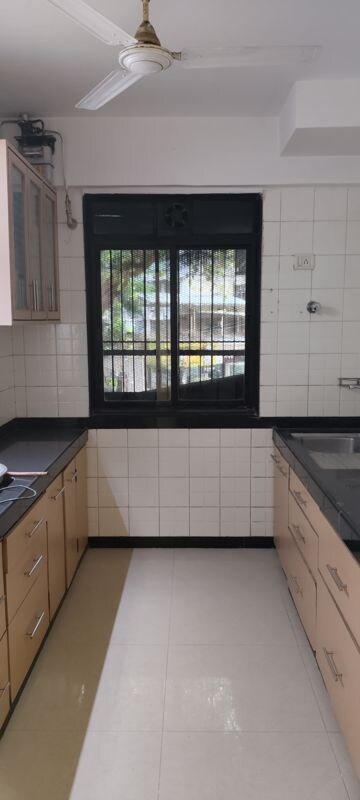 Kitchen in 3 BHK Apartment at Ajmera Golden Rays, Andheri West – for Sale