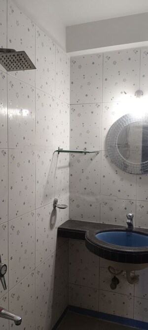 Bathroom in 3 BHK Apartment at Ajmera Golden Rays, Andheri West – for Sale