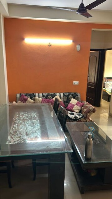 Living Room in 2 BHK Apartment at Aims Golf City, Sector 75 – for Rent