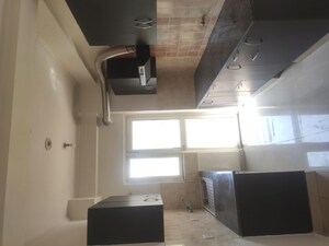 Kitchen in 2 BHK Apartment at Aims Golf City, Sector 75 – for Rent