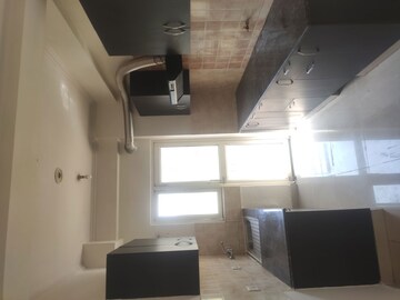 Kitchen in 2 BHK Apartment at Aims Golf City, Sector 75 – for Rent