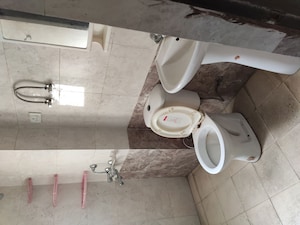 Bathroom in 3 BHK Apartment at Aims Golf City, Sector 75 – for Rent