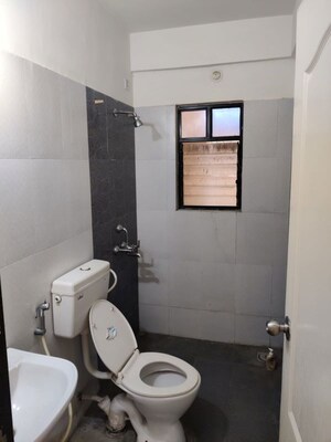 Bathroom in 2 BHK Penthouse at Amrut Runwal Daffodils, Nibm – for Rent