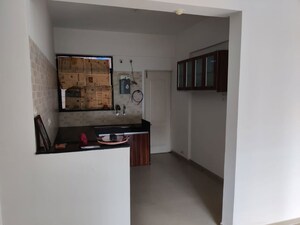 Kitchen in 2 BHK Penthouse at Amrut Runwal Daffodils, Nibm – for Rent