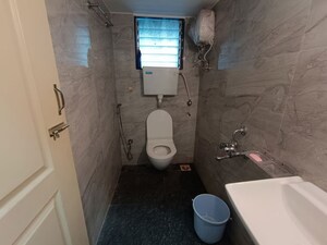 Bathroom in 2 BHK Apartment at Kauls Heritage City Apartment, Vasai West – for Sale