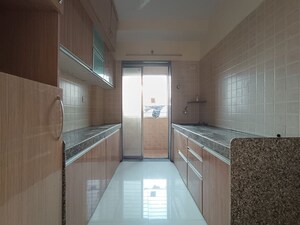 Kitchen in 2 BHK Apartment at Agarwal Township, Vasai West – for Sale