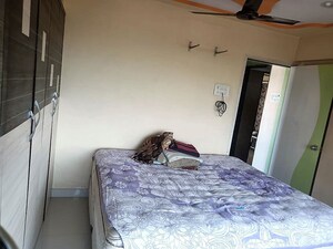 Bedroom in 2 BHK Apartment at Asmita Jyoti CHS, Malad West – for Rent
