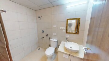 Bathroom in 2 BHK Apartment at Bhartiya City Nikoo Homes II, Thanisandra Main Road – for Sale