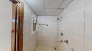 Bathroom in 2 BHK Apartment at Bhartiya City Nikoo Homes II, Thanisandra Main Road – for Sale