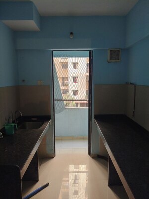 Kitchen in 1 BHK Apartment at Lodha Downtown, Dombivli East – for Sale