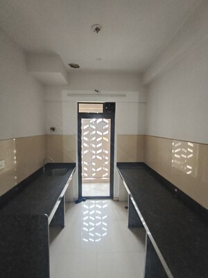 Kitchen in 1 BHK Apartment at Lodha Lakeshore Greens, Dombivli East – for Sale