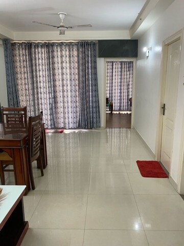 Living Room in 2 BHK Apartment at Sushant Golf City – for Rent