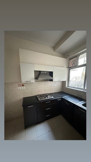 Kitchen in 3 BHK Apartment at Ansal API Esencia, Sector 67 – for Rent