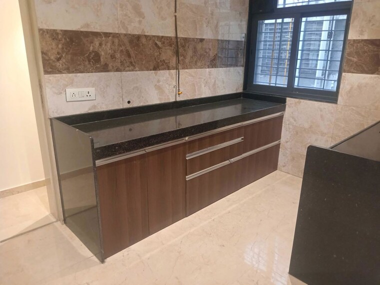 Kitchen, dn nagar 2 Bedroom 780 Sq.Ft. Apartment In Dn Nagar Mumbai 9705696