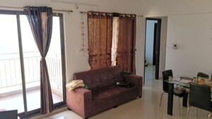 Living Room in 2 BHK Apartment at Shapoorji Pallonji Joyville Hinjewadi, Hinjewadi – for Rent