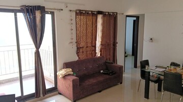 Living Room in 2 BHK Apartment at Shapoorji Pallonji Joyville Hinjewadi, Hinjewadi – for Rent