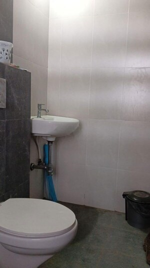Bathroom in 2 BHK Apartment at Shapoorji Pallonji Joyville Hinjewadi, Hinjewadi – for Rent