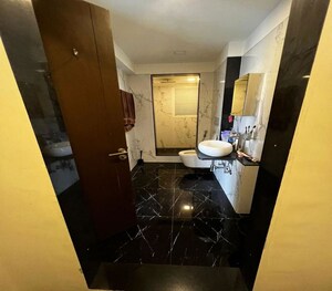 Bathroom in 3 BHK Apartment at Ruparel Ariana, Parel – for Sale